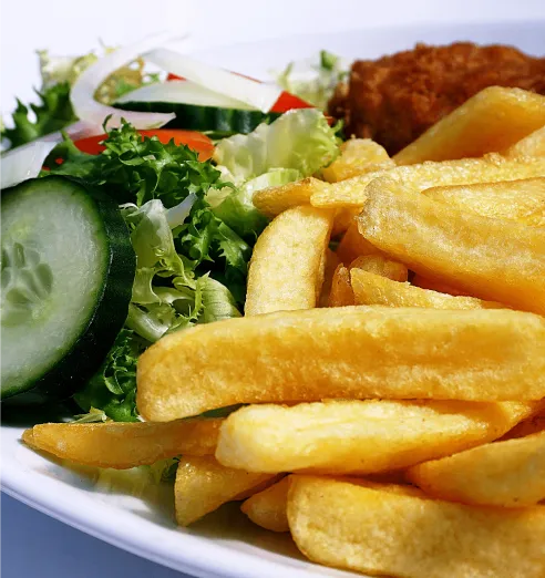 Closeup of Fishcake, Chips and Salad